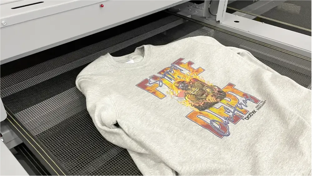 Final printed garment curing in a conveyor dryer